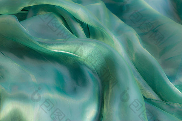 绿色艺术织物纹理背景艺术织物变形模式背景亮度