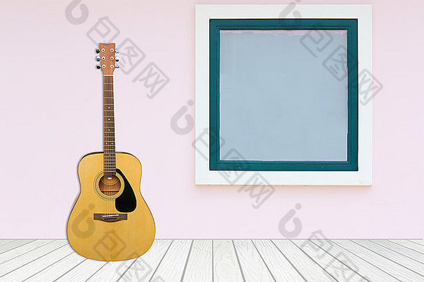 吉他窗口水泥墙木地板上