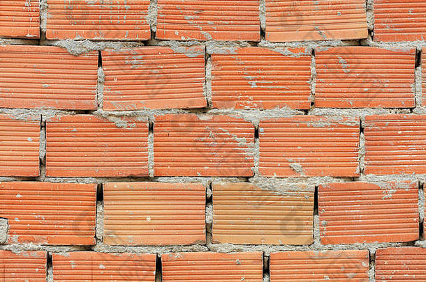 肥胖的砖墙橙色颜色水平纹理水泥缝