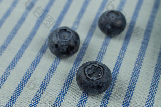 蓝莓浆果条纹餐巾特写镜头新鲜的浆果生素食主义者素食者有益健康的维生素蓝莓蓝莓野生野生浆果