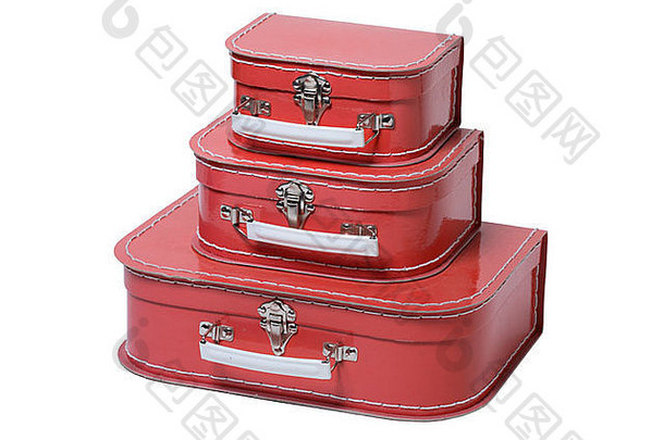 堆栈红色的手提箱减少白色背景