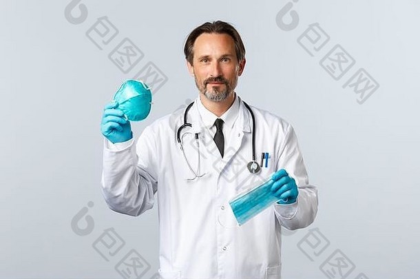 科维德防止<strong>病毒</strong>医疗保健工人疫苗接种概念医生手套白色外套解释区别医疗呼吸器