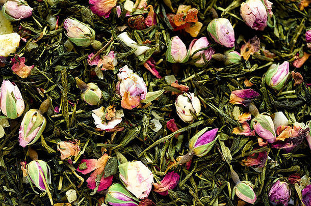 纹理绿色茶玫瑰花瓣干摘背景纹理特写镜头食物背景有机健康的Herbal叶子排毒茶