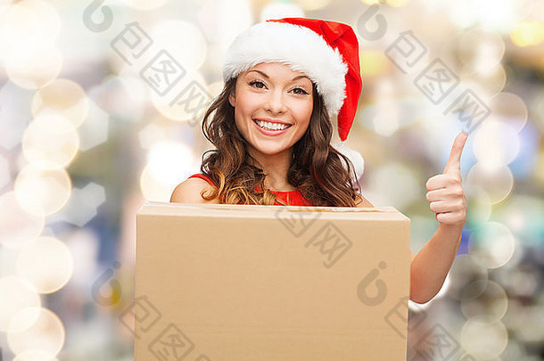 微笑女人圣诞老人助手他包裹盒子