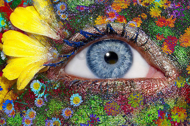 蓝色的女人眼睛化妆春天花比喻色彩斑斓的幻想草地