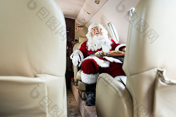 圣诞老人老人睡觉私人飞机