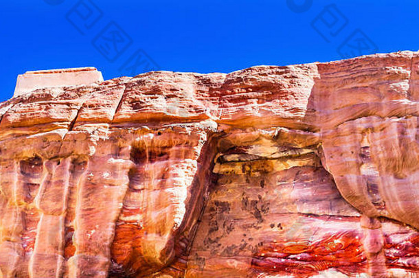 红色的岩石形成摘要皇家坟墓佩特拉约旦建纳巴坦斯玫瑰红色的峡谷墙创建摘要