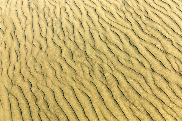 沙子波浪纹理黄色的