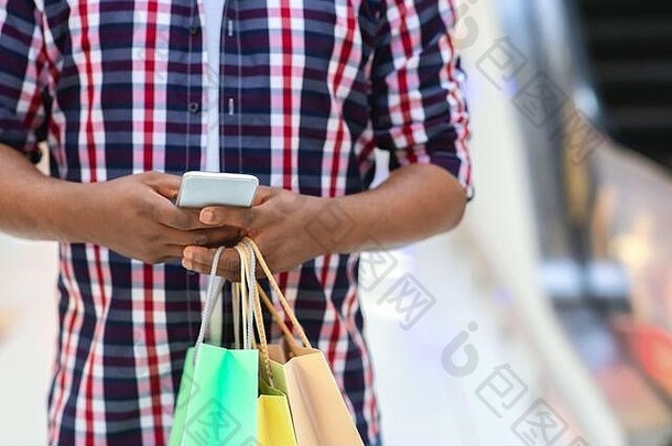 认不出来黑色的的家伙购物袋手智能<strong>手机</strong>购物中心