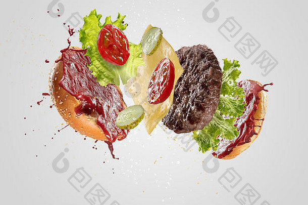汉堡的崩溃孤立的白色背景美味的美味的结合面包Tomatos番茄酱黄瓜沙拉奶酪肉猪肉肉片美食传统的食物营养