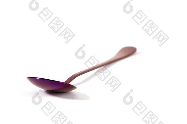 色彩斑斓的紫色的不锈钢钢勺子孤立的白色背景焦点前景浅深度场