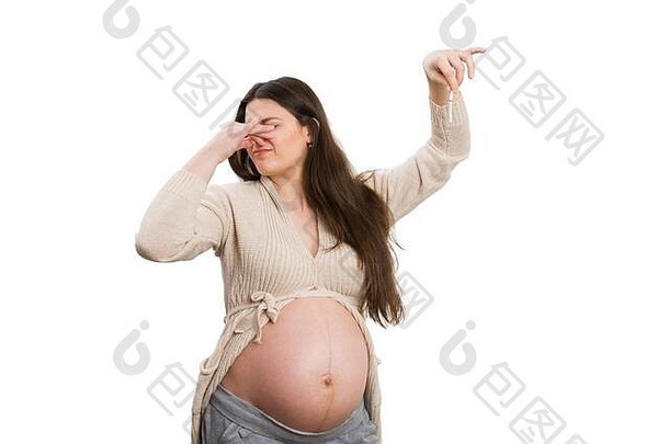 怀孕了女人抓住破碎的香烟持有鼻子不健康的习惯概念孤立的白色背景