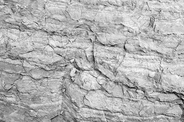 粗糙的白色石头墙自然岩石表面背景照片纹理