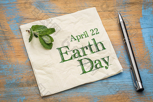 4月地球一天提醒笔迹餐巾新鲜的薄荷叶
