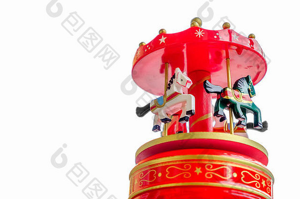 音乐盒子红色的快乐轮旋转木马马玩具特写镜头白色背景