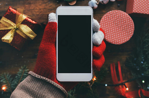 智能手机手圣诞节季节模拟节日假期装饰背景