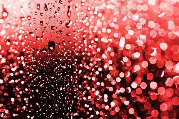 多雨的水下降窗口美丽的闪亮的粒子背景