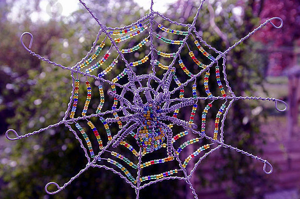 人工蜘蛛网使珠子祖鲁语艺术南非洲