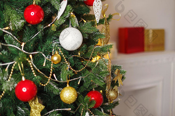 装饰圣诞节树背景假期框架特写镜头红色的黄金白色球分支花环星星背景