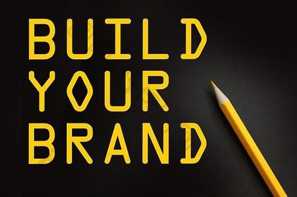 构建品牌单词黑色的黄色的铅笔品牌重塑市场营销业务启动概念