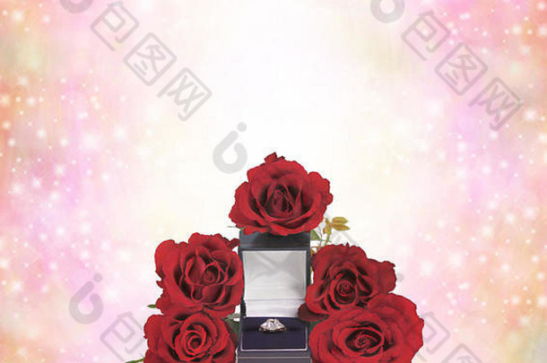 玫瑰头环绕开放环盒子石头订婚环闪闪发光的粉红色的白色背景