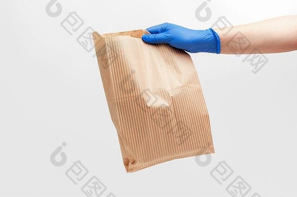 食物交付纸eco-bag<strong>快递</strong>员的手戴着手套
