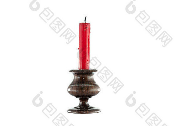 红色的蜡烛木烛台白色背景
