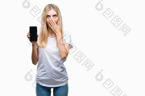 年轻的美丽的金发女郎女人显示智能手机孤立的背景封面口手震惊了羞愧错误表达式恐惧sca