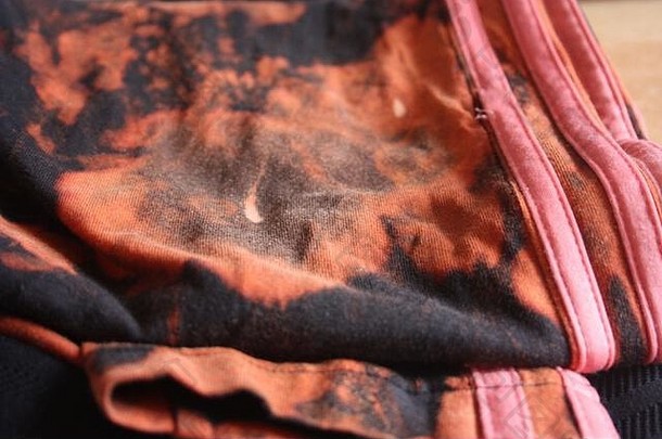 黑色的西装织物染色漂白剂amuchina红色的橙色彩色的点